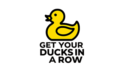 Logo for Get Your Ducks in a Row with yellow background and line art of a duck.