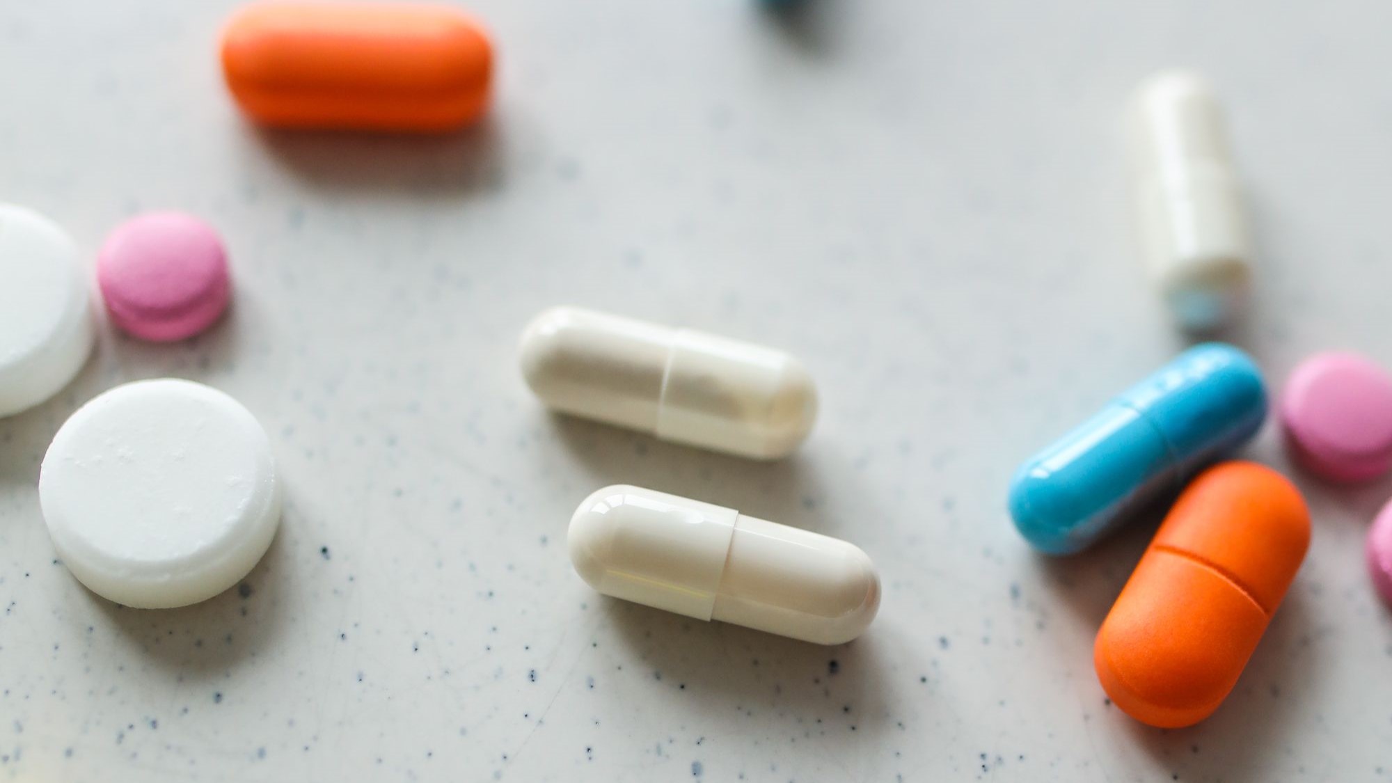 variously shaped, sized, and colored pills
